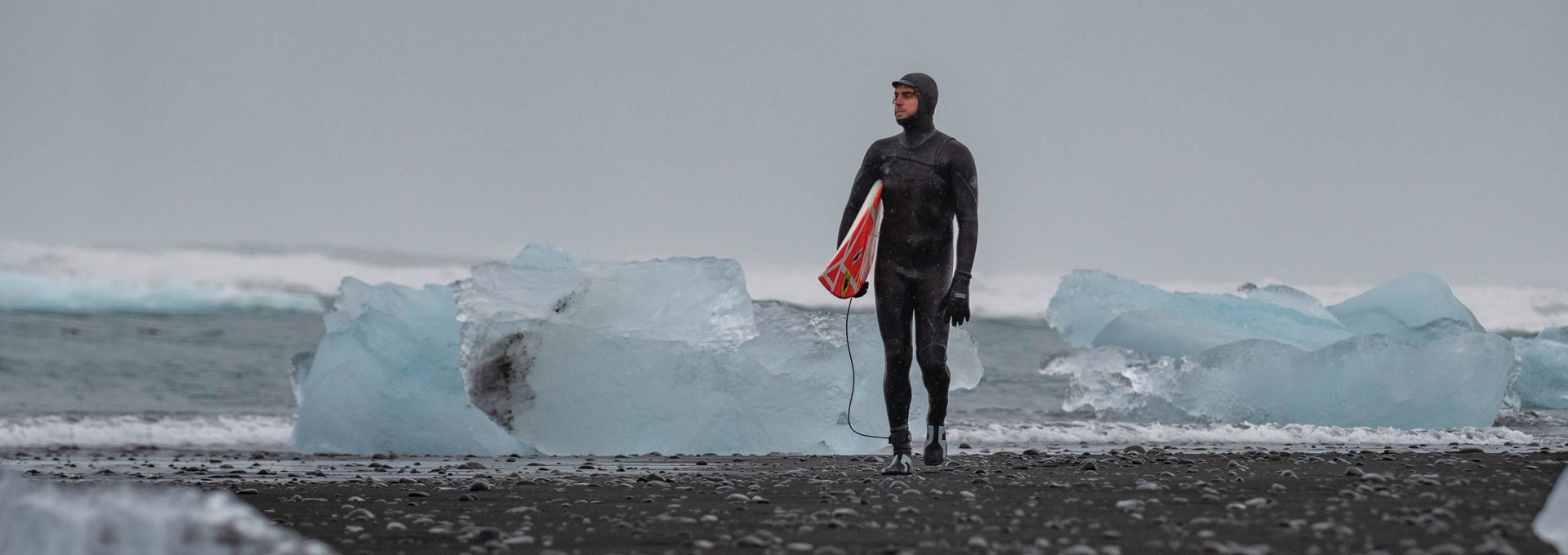 Surfer in a winter wetsuit